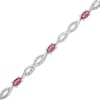 Thumbnail Image 1 of Oval Lab-Created Ruby and Diamond Accent Infinity Braid Line Bracelet in Sterling Silver - 7.25"