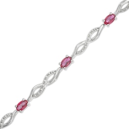 Oval Lab-Created Ruby and Diamond Accent Infinity Braid Line Bracelet in Sterling Silver - 7.25&quot;