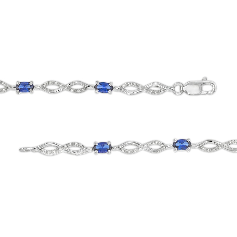 Main Image 3 of Oval Blue Lab-Created Sapphire and Diamond Accent Infinity Braid Line Bracelet in Sterling Silver - 7.25"