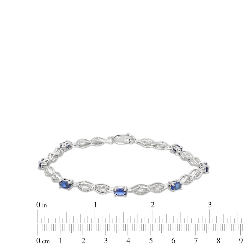 Main Image 4 of Oval Blue Lab-Created Sapphire and Diamond Accent Infinity Braid Line Bracelet in Sterling Silver - 7.25"