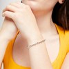 Thumbnail Image 2 of Oval Swiss Blue Topaz and Diamond Accent Infinity Braid Line Bracelet in Sterling Silver - 7.25"