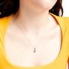 Thumbnail Image 1 of Oval Emerald and 1/15 CT. T.W. Diamond Rectangle Frame Pendant in 10K Gold