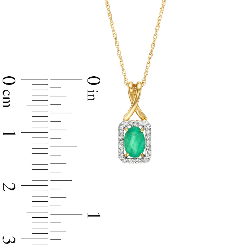 Oval Emerald and 1/15 CT. T.W. Diamond Rectangle Frame Pendant in 10K Gold