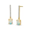 Thumbnail Image 1 of Oval Opal and 1/8 CT. T.W. Diamond Stick Drop Earrings in 10K Gold