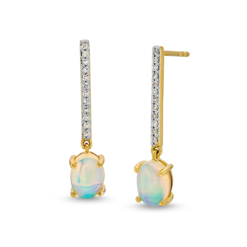 Main Image 1 of Oval Opal and 1/8 CT. T.W. Diamond Stick Drop Earrings in 10K Gold