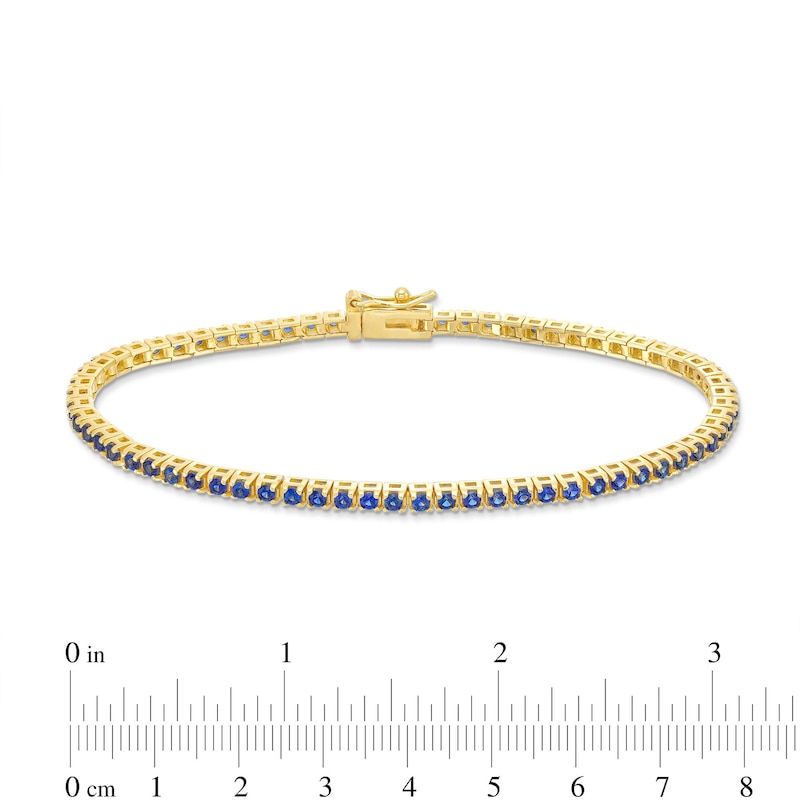 Main Image 4 of Blue Lab-Created Sapphire Tennis Bracelet in Sterling Silver with 18K Gold Plate - 7.25"