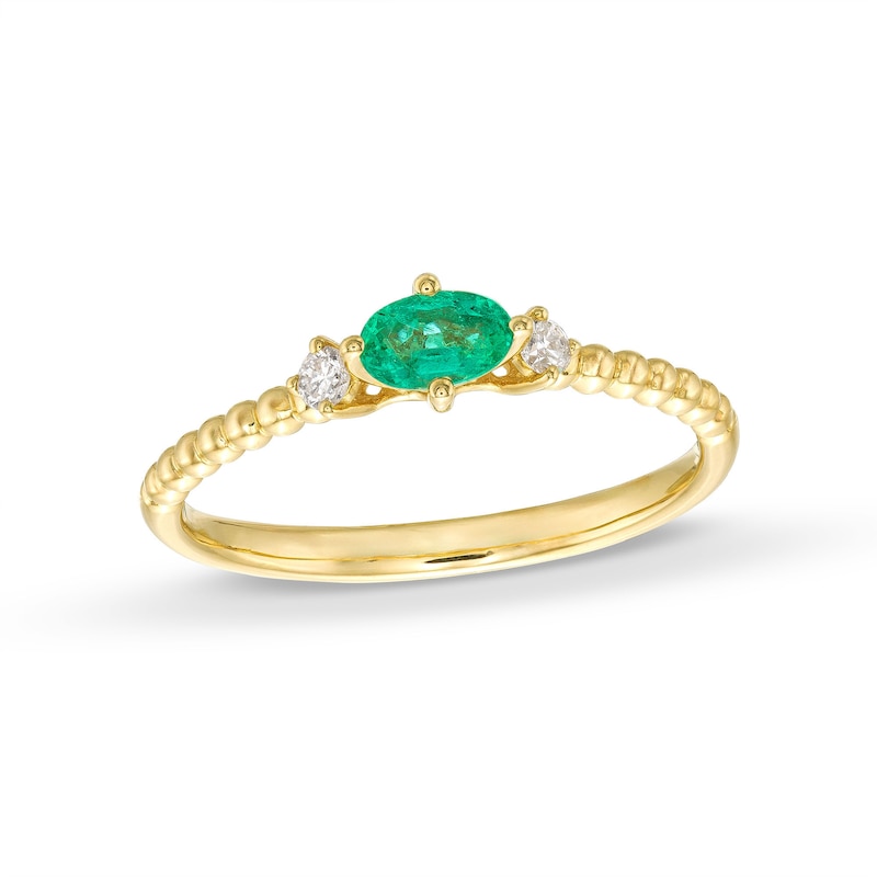Sideways Oval Emerald and 1/15 CT. T.W. Diamond Beaded Ring in 10K Gold