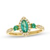 Thumbnail Image 1 of Marquise-Cut Emerald and 1/6 CT. T.W. Diamond Frame Three Stone Ring in 10K Gold