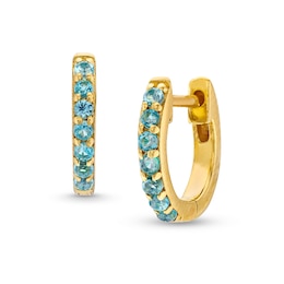 Swiss Blue Topaz Huggie Hoop Earrings in 10K Gold