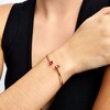 Thumbnail Image 2 of Pear-Shaped Lab-Created Ruby Open Bangle in 10K Gold - 6.75"