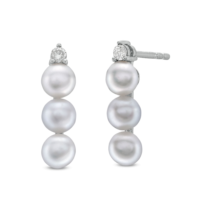 Main Image 1 of 4.0mm Button Freshwater Cultured Pearl and 1/15 CT. T.W. Diamond Linear Three Stone Drop Earrings in Sterling Silver