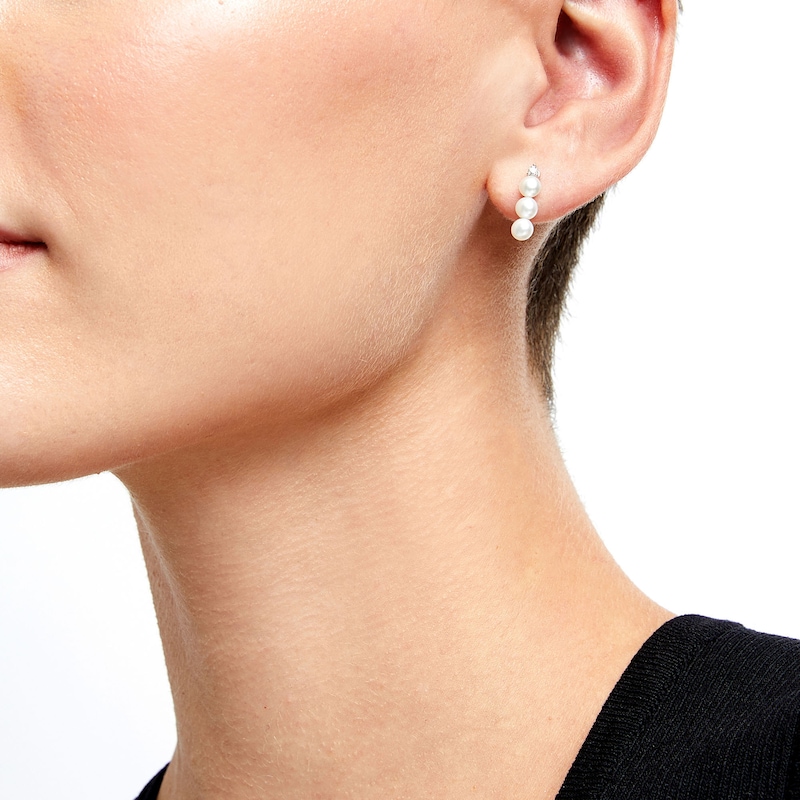 Main Image 2 of 4.0mm Button Freshwater Cultured Pearl and 1/15 CT. T.W. Diamond Linear Three Stone Drop Earrings in Sterling Silver