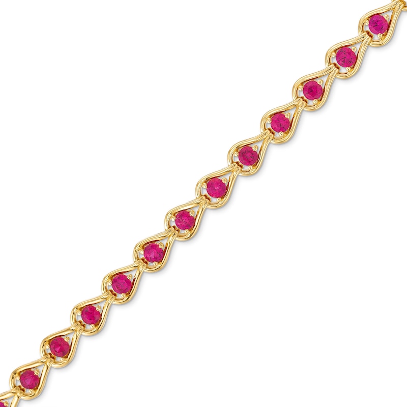 Main Image 1 of Lab-Created Ruby Teardrops Line Bracelet in Sterling Silver with 14K Gold Plate - 7.25"