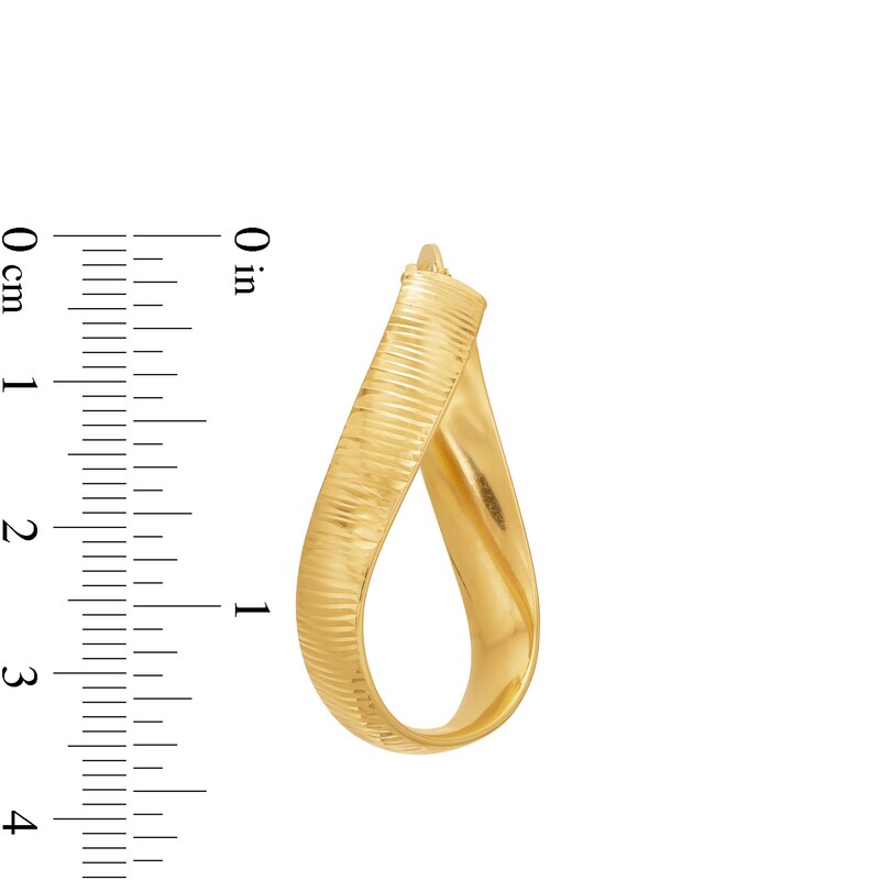 Main Image 3 of Diamond-Cut Wavy 6.0mm Hoop Earrings in Hollow 14K Gold