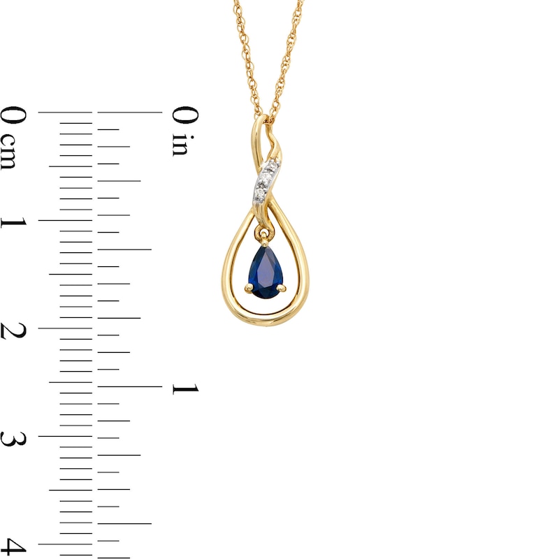 Pear-Shaped Blue Sapphire and Diamond Accent Dangle Flame Outline Pendant in 10K Gold