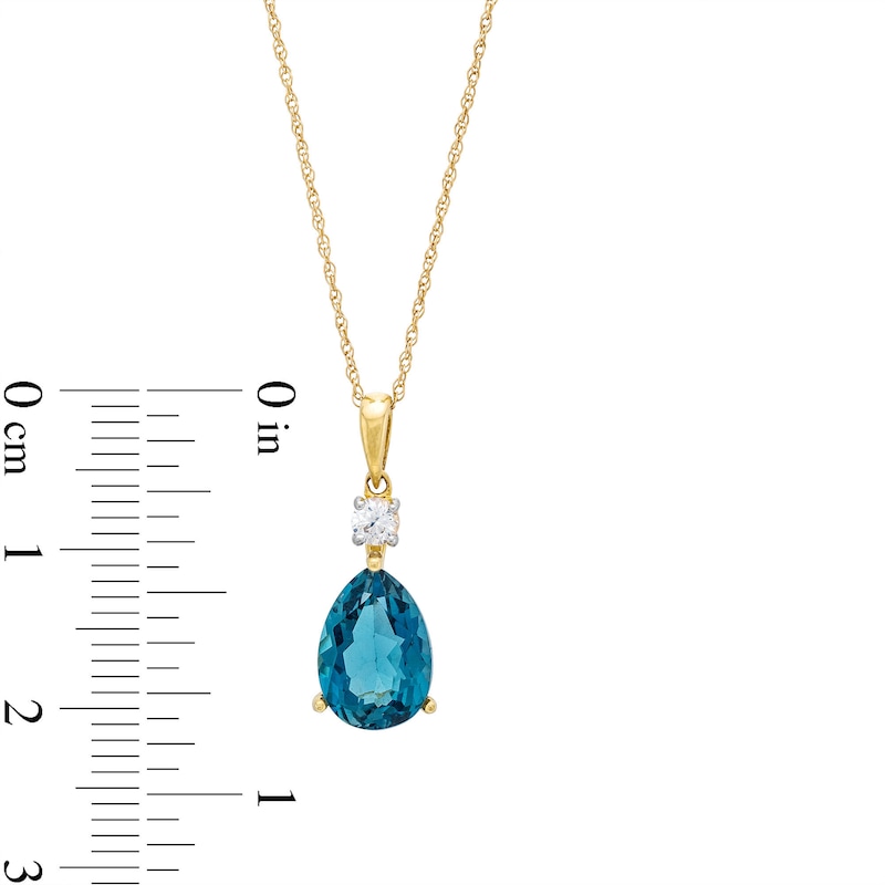 Faceted Pear-Shaped London Blue Topaz and White Lab-Created Sapphire Pendant in 10K Gold