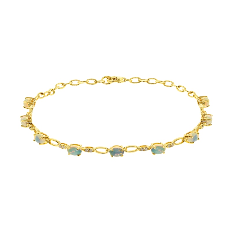 Main Image 1 of Oval-Shaped Opal and 1/8 CT. T.W. Diamond Bracelet in 10K Gold - 7.25"