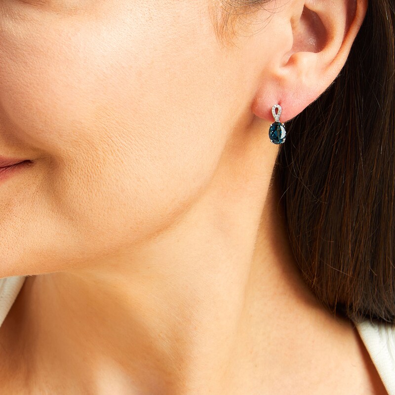 Main Image 2 of Oval London Blue Topaz and 1/20 CT. T.W. Diamond Loop Drop Earrings in 10K White Gold