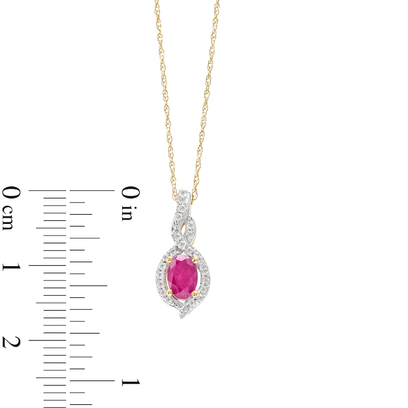 Main Image 3 of Oval-Shaped Ruby and 1/10 CT. T.W. Diamond Swirl Frame Pendant in 10K Gold