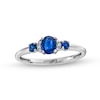 Thumbnail Image 0 of Oval and Round Blue Sapphire with Diamond Accent Three Stone Collar Ring in 10K White Gold