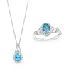 Thumbnail Image 0 of Oval Swiss Blue Topaz and White Lab-Created Sapphire Frame Pendant and Ring Set in Sterling Silver - Size 7