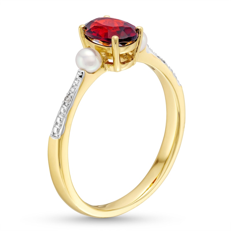 Main Image 3 of Oval Garnet, Freshwater Cultured Pearl and Diamond Accent Three Stone Ring in 10K Gold