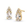 Thumbnail Image 1 of Oval White Lab-Created Sapphire and 1/10 CT. T.W. Diamond Stud Earrings in 10K Gold