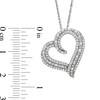 Thumbnail Image 3 of 1/2 CT. T.W. Baguette and Round Diamond Triple Row Tilted Heart Pendant in 10K White Gold