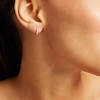 Thumbnail Image 1 of 1/8 CT. T.W. Diamond Huggie Hoop Earrings in 10K Gold