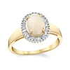 Thumbnail Image 0 of Oval Opal and 1/8 CT. T.W. Baguette-Cut Diamond Frame Ring in 14K Gold