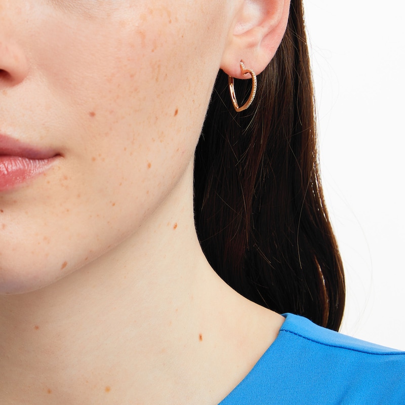 Main Image 2 of 1/10 CT. T.W. Diamond Heart-Shaped Hoop Earrings in 10K Gold