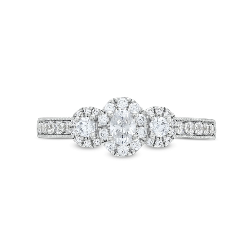 1/2 CT. T.W. Diamond Past Present Future® Oval Framed Engagement Ring in 14K White Gold