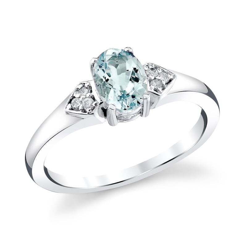 Oval Aquamarine and 1/20 CT. T.W. Diamond Tri-Sides Ring in 14K White Gold
