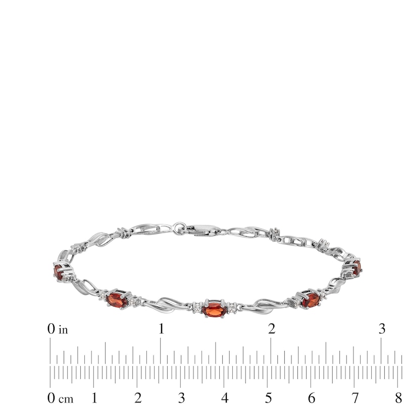 Main Image 4 of Oval Garnet and White Lab-Created Sapphire Bypass Link Alternating Bracelet in Sterling Silver - 7.25”