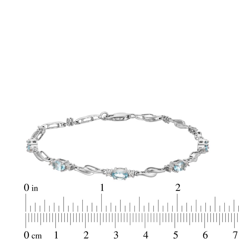 Main Image 4 of Oval Aquamarine and White Lab-Created Sapphire Bypass Link Alternating Bracelet in Sterling Silver - 7.25”