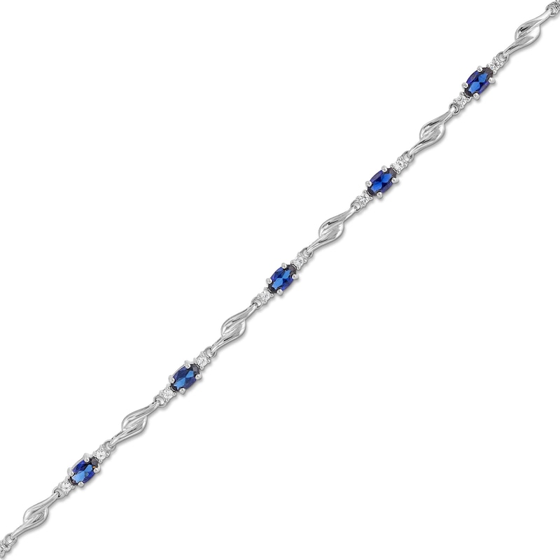 Main Image 1 of Oval Blue and White Lab-Created Sapphire Bypass Link Alternating Bracelet in Sterling Silver - 7.25”