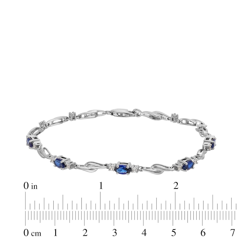 Main Image 4 of Oval Blue and White Lab-Created Sapphire Bypass Link Alternating Bracelet in Sterling Silver - 7.25”