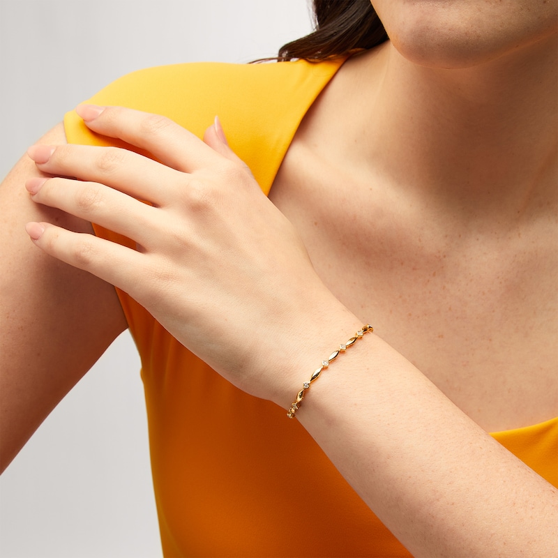 Main Image 2 of 1/10 CT. T.W. Diamond Marquise Link Alternating Line Bracelet in Sterling Silver with 10K Gold Plate