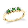 Thumbnail Image 0 of Emerald and 1/15 CT. T.W. Diamond Duo Alternating Three Stone Ring in 14K Gold