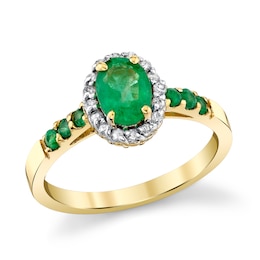Oval Emerald and 1/6 CT. T.W. Diamond Frame Ring in 14K Gold
