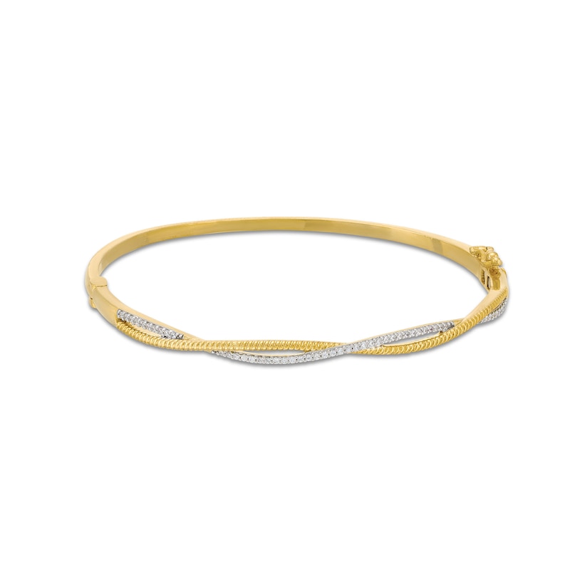 Main Image 1 of 1/4 CT. T.W. Diamond and Rope-Textured Ribbon Twist Bangle in 10K Gold