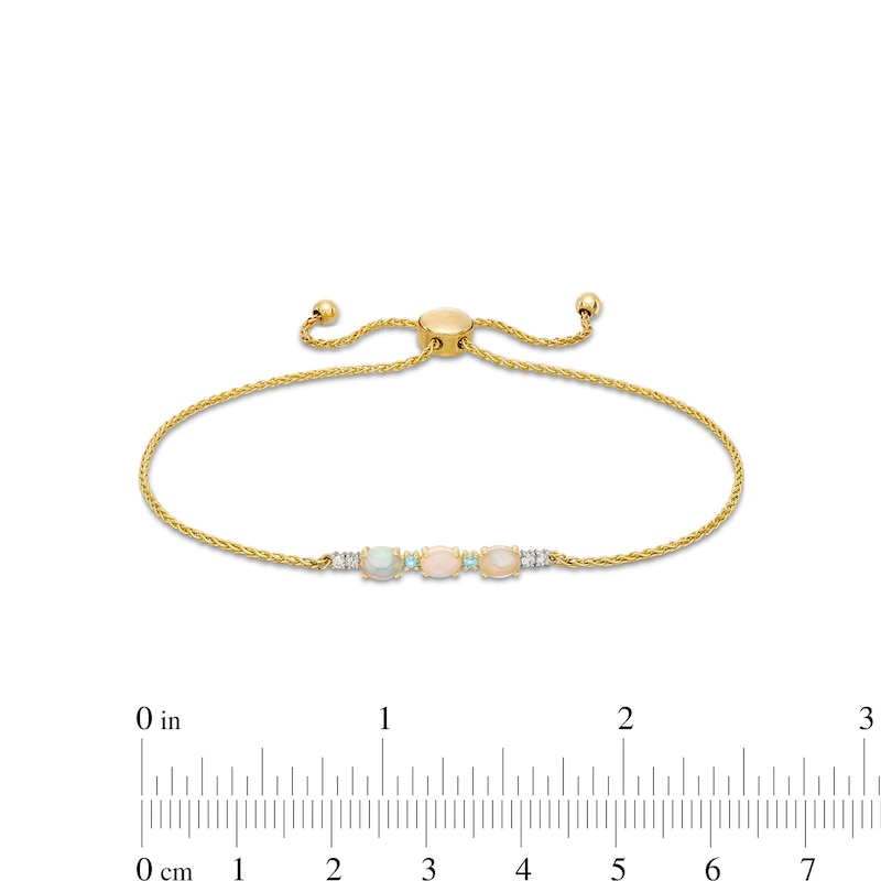Main Image 3 of Oval Opal and Swiss Blue Topaz with Diamond Accent Bolo Bracelet in 10K Gold - 9.0"