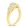 Thumbnail Image 2 of 1/4 CT. T.W. Diamond Frame Three Stone Split Shank Engagement Ring in 10K Gold