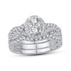 Thumbnail Image 1 of 1-1/8 CT. T.W. Oval Multi-Diamond Frame Twist Shank Bridal Set in 14K White Gold