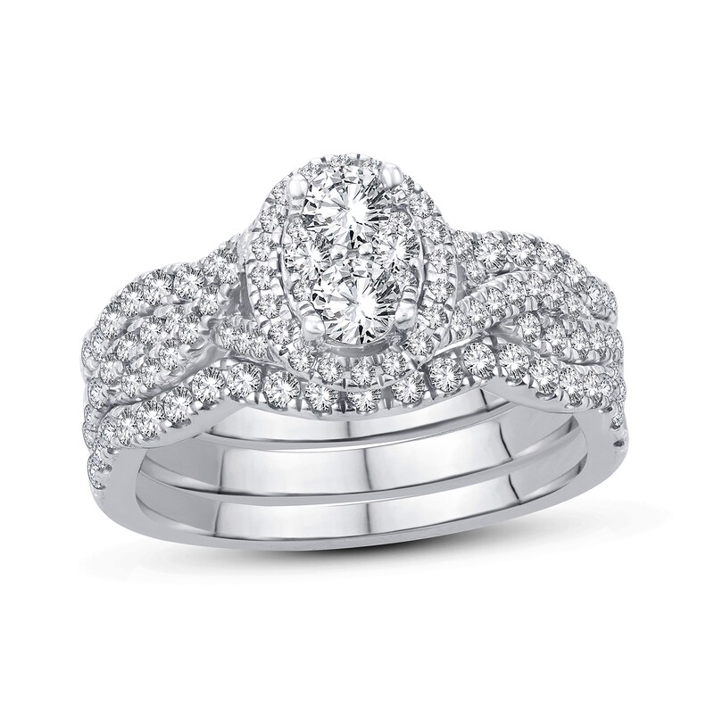 Main Image 1 of 1-1/8 CT. T.W. Oval Multi-Diamond Frame Twist Shank Bridal Set in 14K White Gold