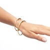 Thumbnail Image 2 of PDPAOLA™ at Zales Graduated Loop Bangle in Brass with 18K Gold Plate - 6.83"