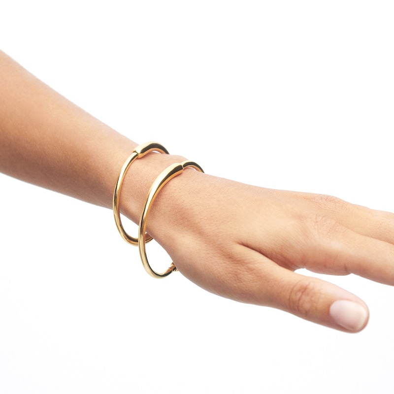 Main Image 2 of PDPAOLA™ at Zales Graduated Loop Bangle in Brass with 18K Gold Plate - 6.83"