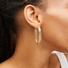 Thumbnail Image 2 of 35.0mm Triple Layered Oval Hoop Earrings in Hollow 10K Gold