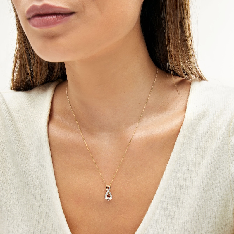 Main Image 2 of 1/5 CT. T.W. Diamond Infinity Pendant in 10K Gold