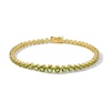 Thumbnail Image 1 of Graduated Peridot Tennis Bracelet in Sterling Silver with 18K Gold Plate - 7.25"